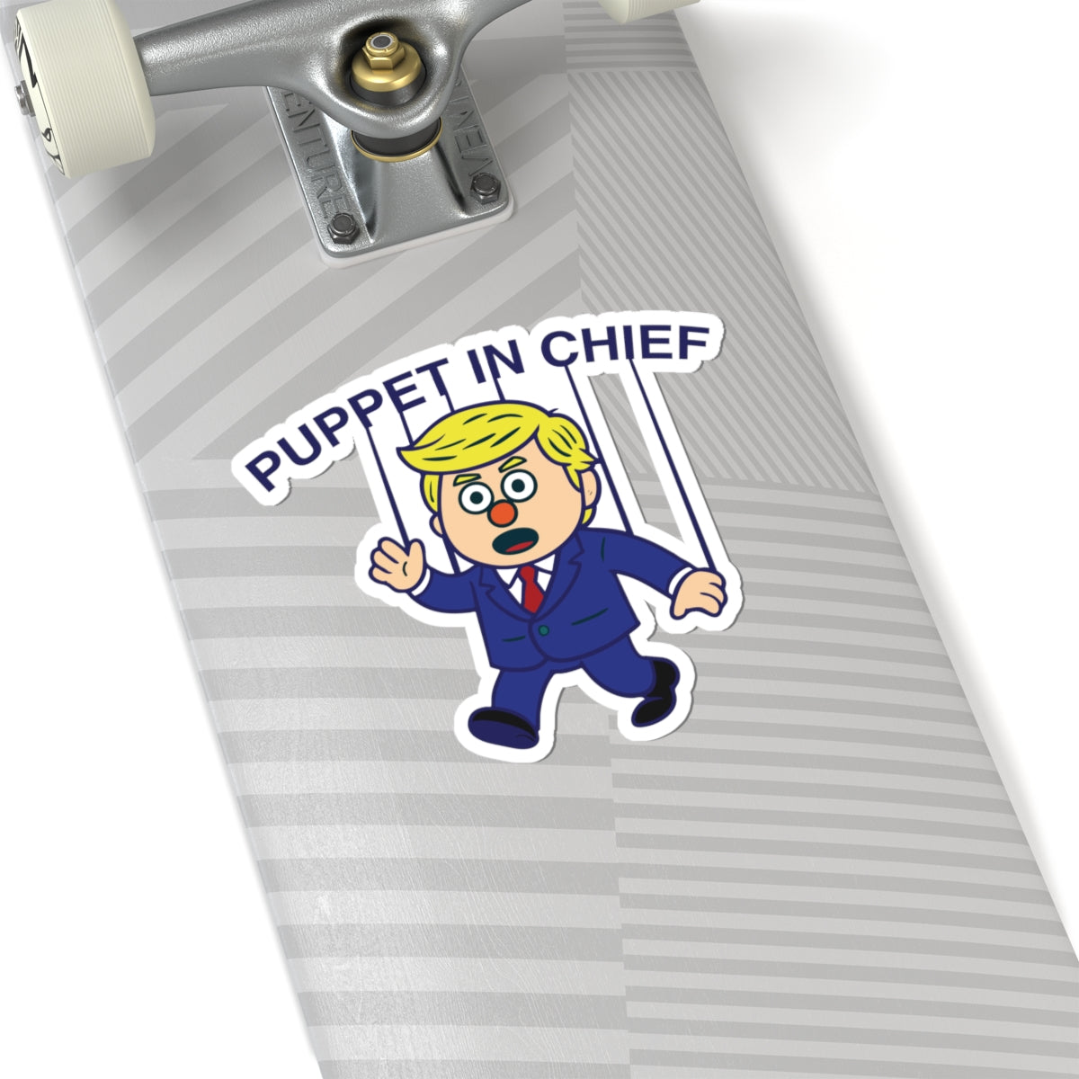 Political Humor Sticker - Puppet in Chief showing cartoon puppet with blonde hair and strings on skateboard deck surface
