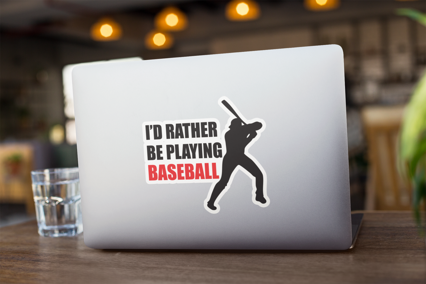 Kiss Sticker - Baseball showing silhouette of batter with red and black text "I'd rather be playing BASEBALL" on laptop surface